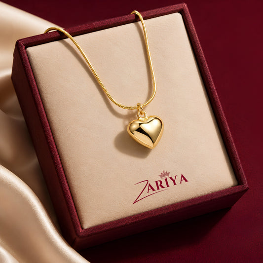 Puffy gold-finished heart pendant necklace by Zariya Official